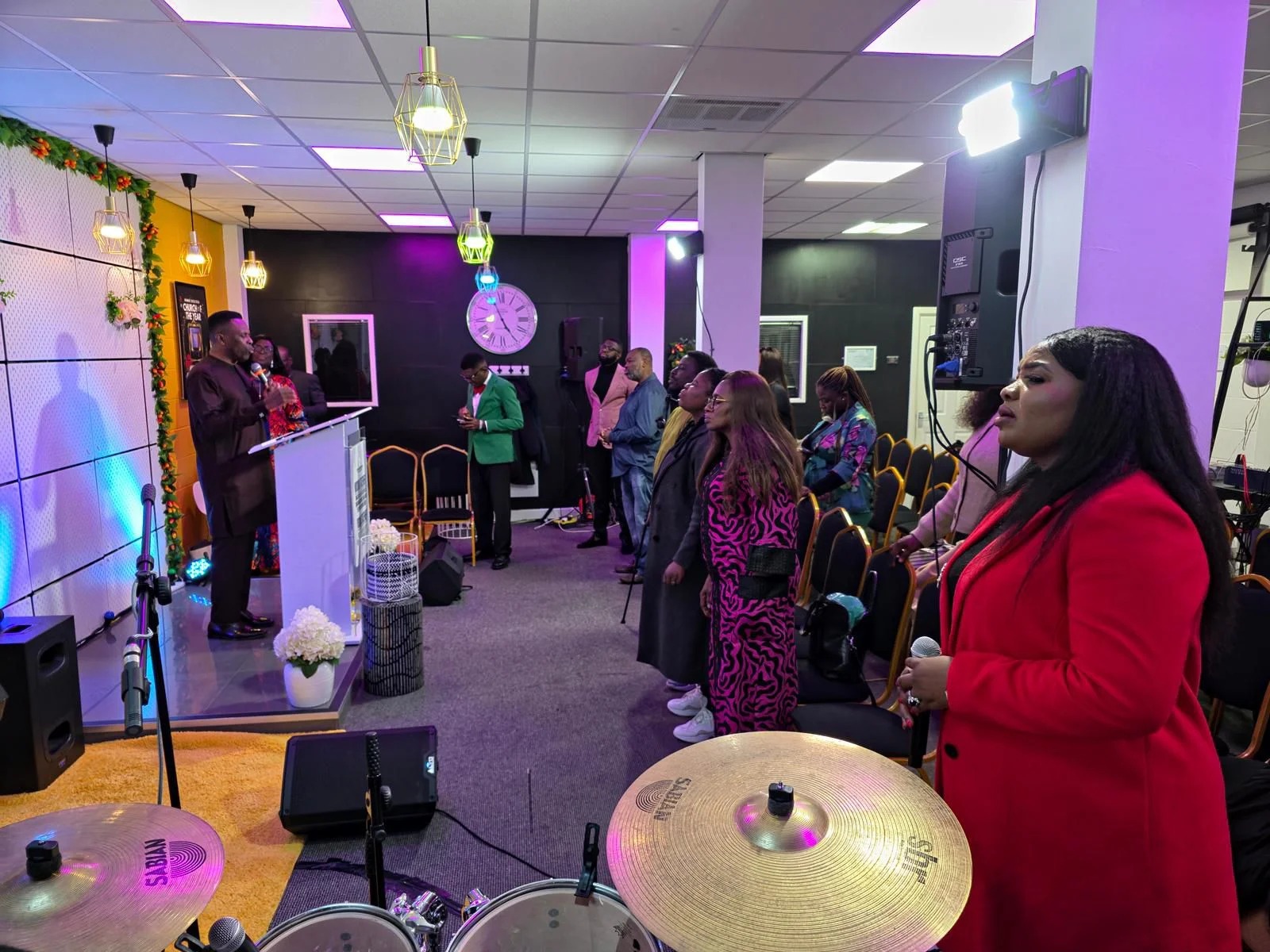 Praise and worship during a Sunday service at CGMI Manchester